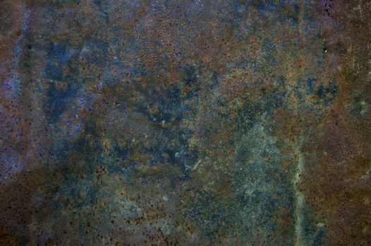 A colored texture of rusted plate of metal