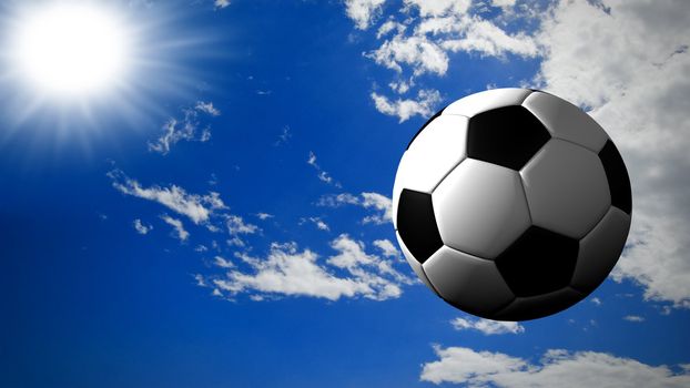 A soccer ball fly in a sunny sky