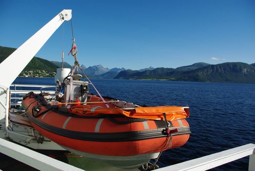 Orange lifeboat aboard the ferry