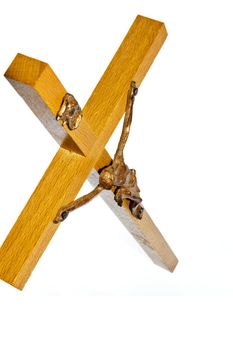 Wooden cross isolated over white background