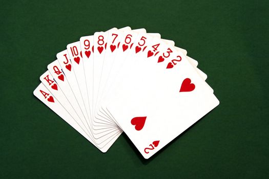 Hearts - Set Of Gaming Cards On Green Background