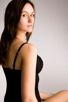 Young woman portrait in the studio on a white background