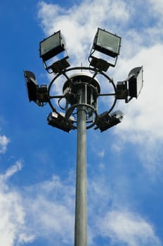 Spot light lamp post in blue sky