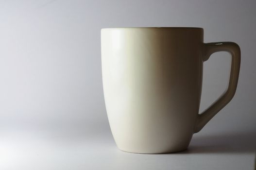 white ceramic cup