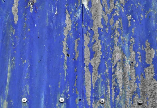 Corrugated steel plate useful as a background