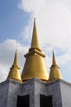 Three golden stupa