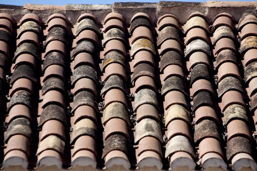 View of a old rough tile rooftop.