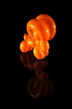 Balloon ram isolated on black with reflection