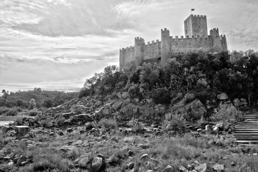 view of the beautiful Almourol Castle located on the Tagus River on Portugal.