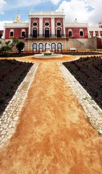 View of the park and fore part of the Palace of Estoi village located on the Algarve, Portugal.