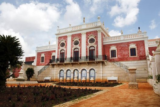 View of the park and fore part of the Palace of Estoi village located on the Algarve, Portugal.