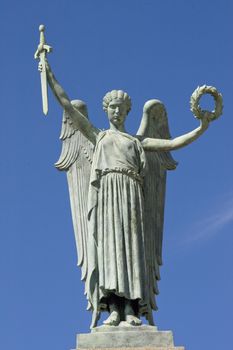 Female statue of the Rossio de Sao Bras, located in Evora city, Portugal.