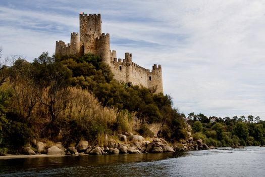 View of the beautiful Almourol castle located on a small island on the middle of the Tagus river, Portugal.