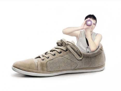 Concept with photographer going to make photos in a shoe