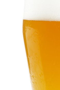 half wheat beer in a glass on white background