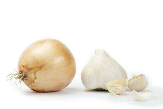 onion with garlic and garlic cloves on white background