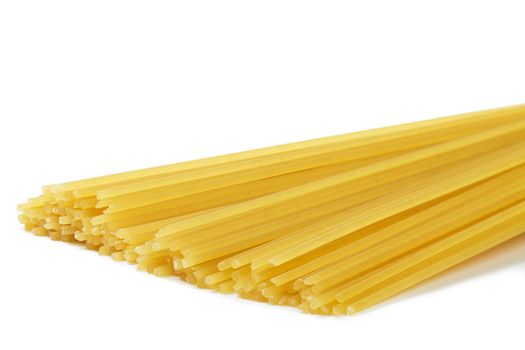 raw yellow spaghetti isolated on white background