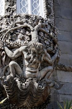 Close up view of the gargoyle creature in the Pena Palace on Lisbon, Portugal.