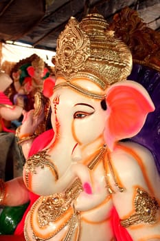 A portrait of teh face of lord ganesha, the elephant god.