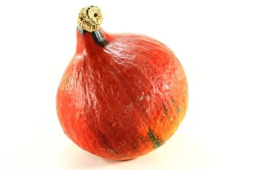 a Hokkaido pumpkin on a white background