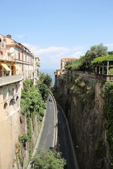 A narrow, winding road in the city of Sorrento