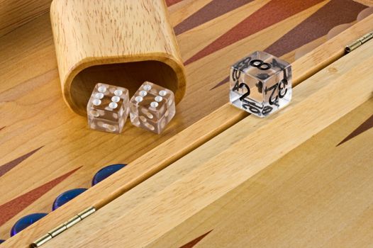 Backgammon board with a roll of double sixes.