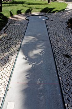 View of an equipment on a public park for the practice of mini-golf.