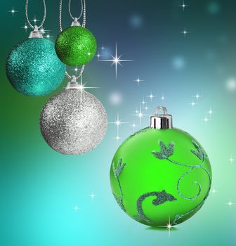 Colorful green and blue christmas baubles balls with colorful background