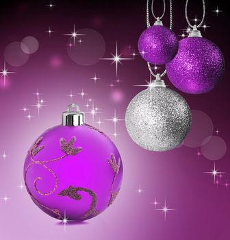 Colorful pink and silver christmas baubles balls with colorful background