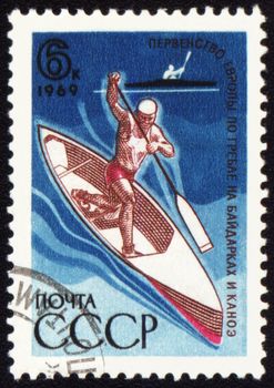 USSR - CIRCA 1969: A stamp printed in USSR shows an oarsman, devoted to European championship in canoe paddling, circa 1969