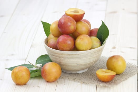 Fresh ripe plums in the bowl