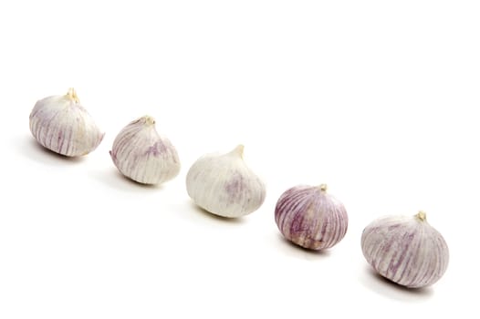 a lot of garlic on a white background