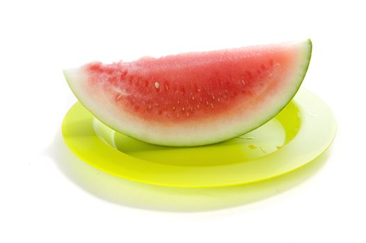 a slice of a fresh and healthy watermelon on a plate