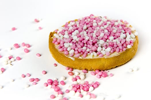 a rusk with white and pink mice, a dutch tradition