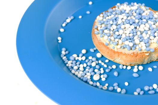 a rusk with blue and white mice, a dutch tradition