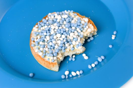 a rusk with blue and white mice, a dutch tradition
