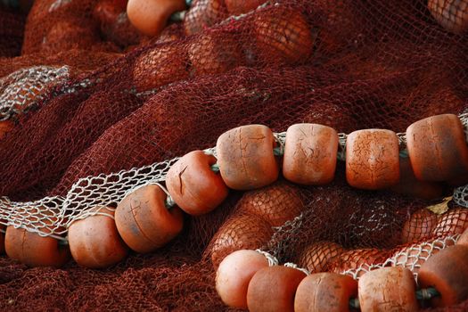 Close view of some fishing gear, including nylon string and floaters.