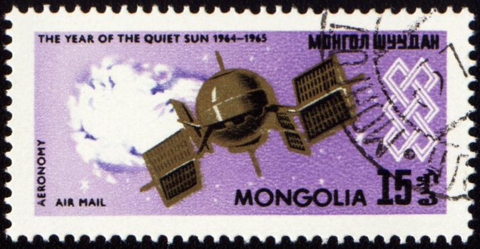 MONGOLIA - CIRCA 1965: stamp printed in Mongolia, shows weather satellite, series "The year of quiet Sun", circa 1965