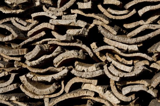 Pile of harvested bark from cork oak trees.