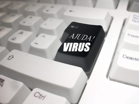 black enter key on a white keyboard with the following phrase: "Ajuda! Virus"