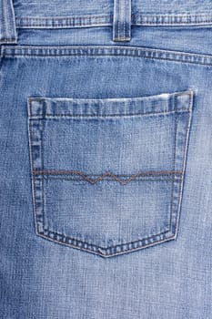 Dark blue jeans with a pocket as a background.