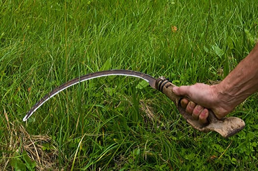 A sickle is used for cutting grass