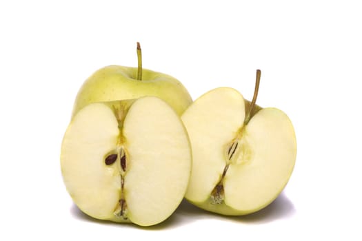 Close view of a bunch of yellow ginger gold variety type apples isolated on a white background.