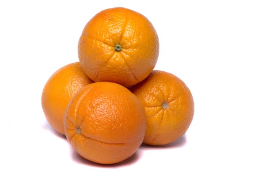 Close view of a bunch of oranges isolated on a white background