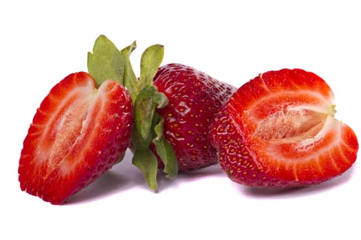 Close view of a bunch of strawberry fruits isolated on a white background.