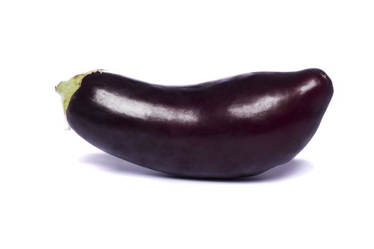 Close up view of an eggplant vegetable isolated on a white background.