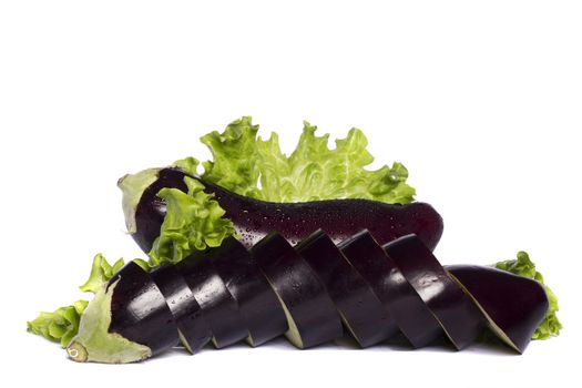 Close up view of an eggplant vegetable isolated on a white background.