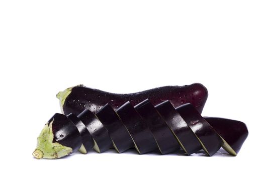 Close up view of an eggplant vegetable isolated on a white background.