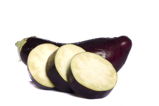 Close up view of an eggplant vegetable isolated on a white background.