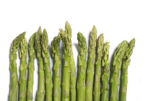 Close up view of a bunch of asparagus vegetable isolated on a white background.